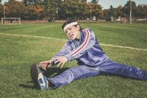 a woman exercising under duress