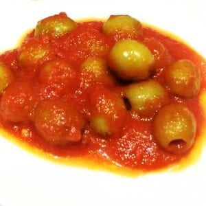 Whole green olives in tomato sauce